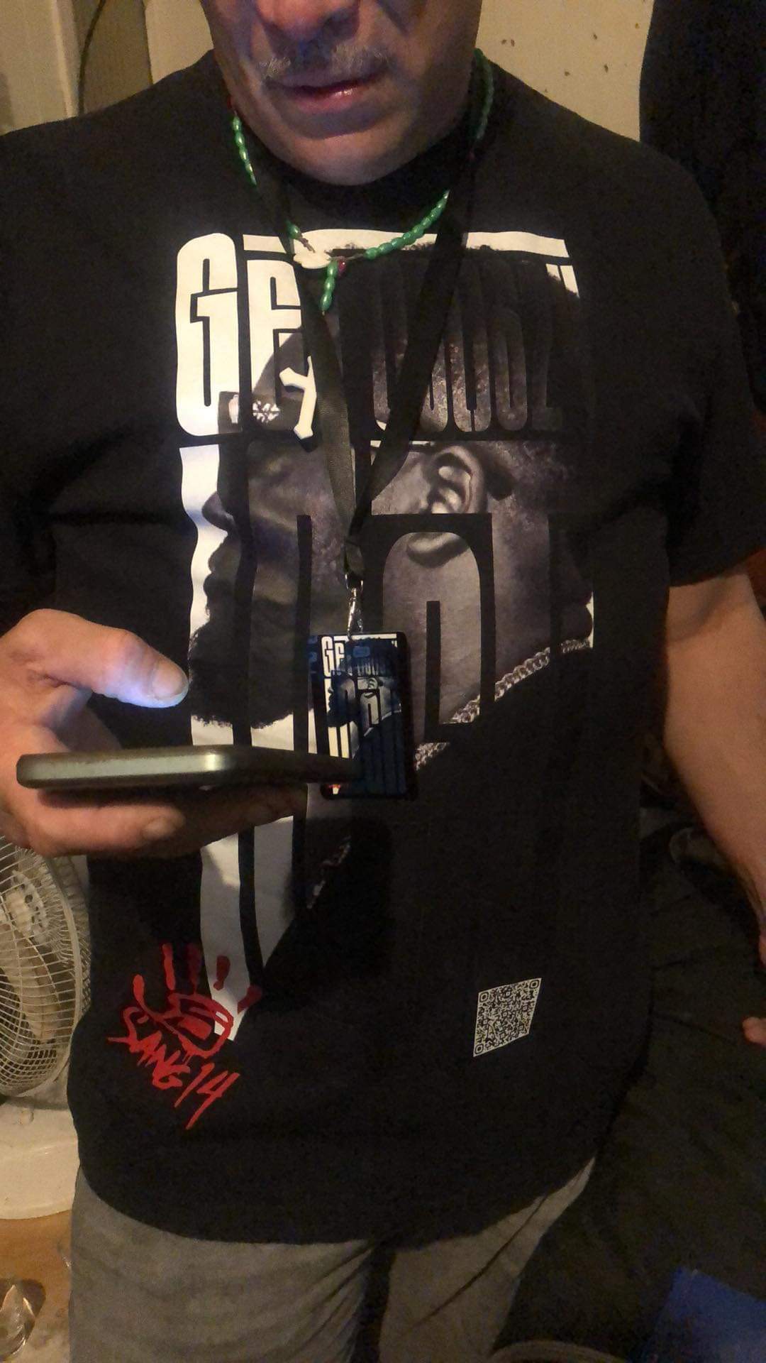 Custom printed black T-shirt with lanyard